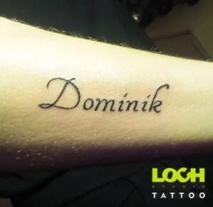 Loch Studio Tattoo - mały tatuaż imię Dominik