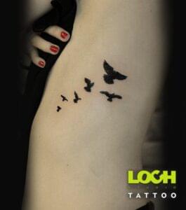 Loch Studio Tattoo - mały tatuaż czarne ptaki