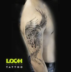 Loch Studio Tattoo - Feniks z mieczem