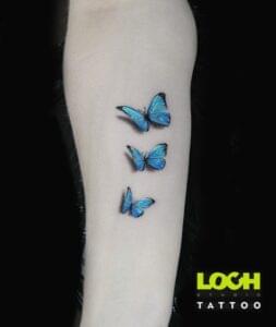 Loch Studio Tattoo - mały tatuaż kolorowe motyle